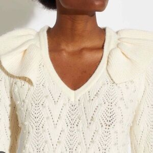 Elegant Cream Sweater with Pearl Detailing